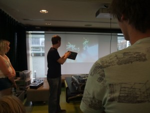 Demonstrating TouchOSC on the Ipad in a VJing class for Haigh School art students at The Edge, Queensland State Library, Brisbane
