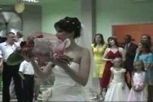 The bride picks one of the bouquets from those given by guests, not the bridal bouquet, and throws it into the crowd.